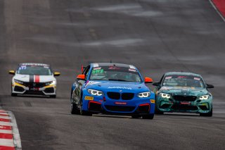 #51 BMW M240iR of Austen Smith, AutoTechnic Racing, TC, TC America, SRO America, Circuit of the Americas, Austin, Texas, April May 2021. | Sarah Weeks/SRO             