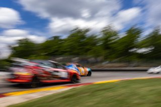 #06 BMW M240iR (*2019 EVO)of Matthew Ibrahim, DRS & Garagistic, TC America, TC, and #9 Honda Civic Type-R, of Kevin Boehm, Skip Barber Racing, SRO America, Road America, Elkhart Lake, WI, August 2022
 | Regis Lefebure/SRO