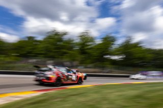 #06 BMW M240iR (*2019 EVO)of Matthew Ibrahim, DRS & Garagistic, TC America, TC, and #9 Honda Civic Type-R, of Kevin Boehm, Skip Barber Racing, SRO America, Road America, Elkhart Lake, WI, August 2022
 | Regis Lefebure/SRO