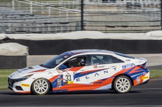 #33 Hyundai Elantra N-Line, of Tyler Delgado, BRYAN HERTA AUTOSPORT W/ CURB-AGAJANIAN, TC America, TCA, SRO America, Indianapolis Motor Speedway, Indianapolis, Indiana, Oct 2022.
 | Brian Cleary/SRO