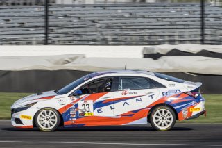#33 Hyundai Elantra N-Line, of Tyler Delgado, BRYAN HERTA AUTOSPORT W/ CURB-AGAJANIAN, TC America, TCA, SRO America, Indianapolis Motor Speedway, Indianapolis, Indiana, Oct 2022.
 | Brian Cleary/SRO