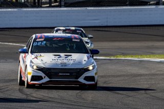 #33 Hyundai Elantra N-Line, of Tyler Delgado, BRYAN HERTA AUTOSPORT W/ CURB-AGAJANIAN, TC America, TCA, SRO America, Indianapolis Motor Speedway, Indianapolis, Indiana, Oct 2022.
 | Brian Cleary/SRO
