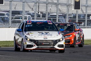 #33 Hyundai Elantra N-Line, of Tyler Delgado, BRYAN HERTA AUTOSPORT W/ CURB-AGAJANIAN, TC America, TCA, SRO America, Indianapolis Motor Speedway, Indianapolis, Indiana, Oct 2022.
 | Brian Cleary/SRO